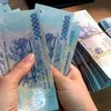 Giả chữ ký khách hàng, tất toán sổ tiết kiệm, nhân viên ngân hàng vào tù