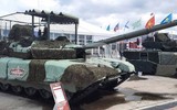 Xe tăng T-80BVM Nga được trang bị thêm giáp để đối phó với UVA tự sát