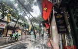 [ẢNH] Hà Nội đẹp lạ dưới mưa trong Ngày kỷ niệm 67 năm giải phóng Thủ đô