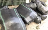 Cận cảnh cơ sở sản xuất hàng nghìn áo thể thao giả các thương hiệu lớn