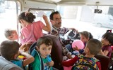 [Ảnh] Niềm vui được đi học trở lại của trẻ tị nạn Syria