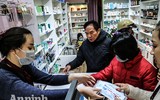 [ẢNH] Hà Nội: Người dân đổ xô đi mua khẩu trang y tế, chỗ phát miễn phí, nơi bán đắt gấp 2,3 lần