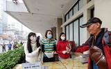 [ẢNH] Công an Thủ đô tham gia phát miễn phí 75.000 khẩu trang phòng dịch Corona