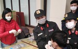 [ẢNH] Công an Thủ đô tham gia phát miễn phí 75.000 khẩu trang phòng dịch Corona