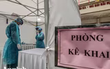 [ẢNH] Cận cảnh việc thực hiện xét nghiệm nhanh Covid- 19, 10 phút có kết quả ngay ở Hà Nội