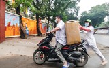 [ẢNH] Cận cảnh việc thực hiện xét nghiệm nhanh Covid- 19, 10 phút có kết quả ngay ở Hà Nội