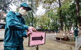 [ẢNH] Cận cảnh việc thực hiện xét nghiệm nhanh Covid- 19, 10 phút có kết quả ngay ở Hà Nội