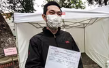 [ẢNH] Cận cảnh việc thực hiện xét nghiệm nhanh Covid- 19, 10 phút có kết quả ngay ở Hà Nội