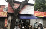 [Ảnh] Cửa hàng mở hé mua bán chui, bất chấp lệnh cấm còn 4 ngày