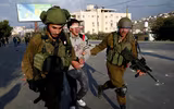 Lính Israel mạnh tay trấn áp người biểu tình Palestine (2)