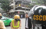 [ẢNH] Nữ cảnh sát Cơ động đặc nhiệm tuần tra trên phố, xử lý vi phạm