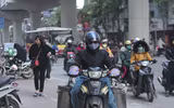[ẢNH] Người dân Hà Nội co ro trong cái rét đậm nhất mùa