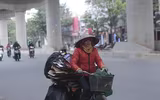 [ẢNH] Người dân Hà Nội co ro trong cái rét đậm nhất mùa