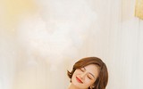 Thùy Anh khoe vai trần trong bộ ảnh Giáng sinh rực rỡ