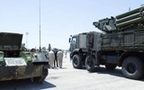 Tổng thống Syria Bashar Al-Assad ngồi 