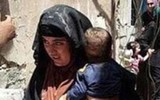 Ám ảnh nữ khủng bố ôm con nhỏ để đánh bom tự sát giết binh sĩ quân đội Iraq