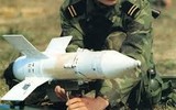[ẢNH] Bất ngờ xuất hiện tên lửa chống tăng trong kho vũ khí bị thu giữ của phiến quân Syria