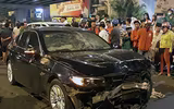 [ẢNH] Người lái BMW tông loạt xe máy dừng đèn đỏ ở TP.HCM nhận ''có bia rượu''