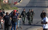[ẢNH] Đấu súng dữ dội dọc biên giới Venezuela - Colombia