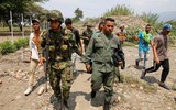 [ẢNH] Đấu súng dữ dội dọc biên giới Venezuela - Colombia