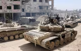 [ẢNH] Phận bi tráng của chiến tăng T-55MV Syria trên cánh đồng chết Idlib