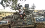 [ẢNH] Phận bi tráng của chiến tăng T-55MV Syria trên cánh đồng chết Idlib