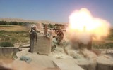[ẢNH] Khốc liệt tại Syria, binh sĩ vác cả pháo không giật lên vai để khai hỏa