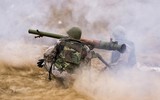 [ẢNH] Khốc liệt tại Syria, binh sĩ vác cả pháo không giật lên vai để khai hỏa