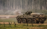 [ẢNH] Xe bọc thép BTR-82A của Nga né thiết giáp Mỹ tại Syria