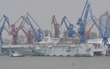 [ẢNH] Boong chưa hoàn thiện, Trung Quốc vẫn hạ thủy tàu sân bay trực thăng thứ hai
