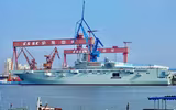 [ẢNH] Tàu đổ bộ trực thăng của Trung Quốc chạy thử nghiệm khi đang thi công dang dở