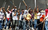 [ẢNH] Tình cảnh tuyệt vọng ở quê nhà khiến người Honduras 