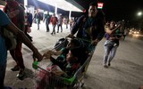 [ẢNH] Hành trình gian khổ của đoàn người di cư Honduras đang đổ về biên giới với Mỹ