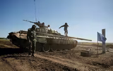 [ẢNH] Ly khai miền Đông Ukraine học tập chiến thuật sử dụng xe tăng của Syria