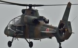 [ẢNH] Phi đội trực thăng OH-1 Ninja Nhật Bản quay lại bầu trời sau...4 năm nằm đất