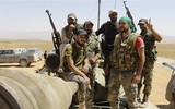[ẢNH] Kho đạn lớn nhất của quân đội Syria nổ tung, hàng ngàn tấn đạn dược thành tro bụi