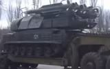 [ẢNH] Tình báo Ukraine xâm nhập bắt sống lái xe đầu kéo chở tổ hợp Buk-M1 đã bắn rơi MH17?