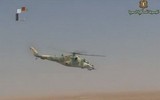 [ẢNH] Trực thăng vũ trang Syria bất ngờ tấn công dữ dội phiến quân tại Lattakia