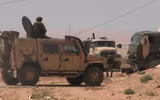 [ẢNH] Đoàn xe tuần tra quân cảnh Nga bị trúng mìn tại Daraa, Syria