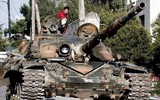 [ẢNH] Quân đội Syria, Thổ Nhĩ Kỳ tiếp tục giao tranh bất chấp lệnh ngừng bắn