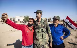 [ẢNH] Quân đội Syria cùng vũ khí hạng nặng ào ạt trở lại thị trấn Tal Tamr