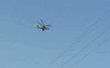 [ẢNH] Trực thăng vũ trang Nga truy đuổi máy bay không người lái Mỹ trên bầu trời Syria?