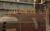 [ẢNH] Hiện trường vụ tàu ngầm Nga chìm theo ụ nổi trong cảng Sevastopol