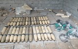 [ẢNH] Phiến quân ngụy trang trận địa pháo phóng loạt 