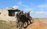 [ẢNH] Lực lượng tiếp viện của quân đội Syria tới Idlib trong tình hình nóng