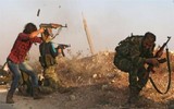 [ẢNH] Giao tranh dữ dội giữa nhiều lực lượng trên khắp miền Bắc Syria