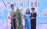 [ẢNH] Khoảnh khắc xúc động phiên đấu giá 32 giò lan của liệt sĩ phi công Khuất Mạnh Trí