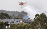 [ẢNH] Australia vẫn căng thẳng tìm cách dập tắt những đám cháy rừng