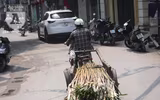 [Ảnh] Đa dạng cách chống nắng của người Hà Nội trong ngày đầu nóng cao điểm