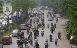 [Ảnh] Người dân Hà Nội chật vật di chuyển, mưu sinh trong cái nắng 40 độ C